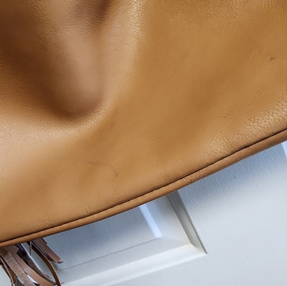 Jessica Simpson, faux leather Women Ten Tote, Color: Tan with fringe on sides.!! - Picture 5 of 10